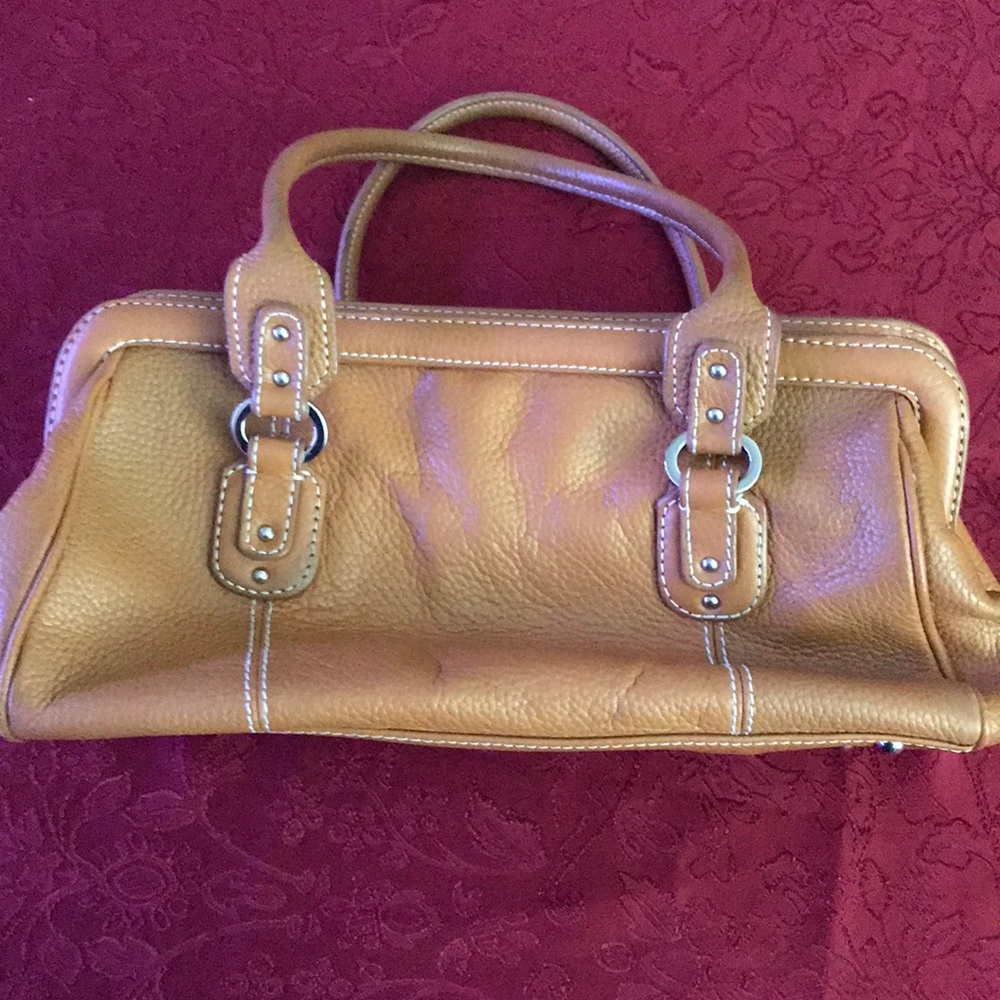 GUC Tignanello Handbag. Slight wear on one corner